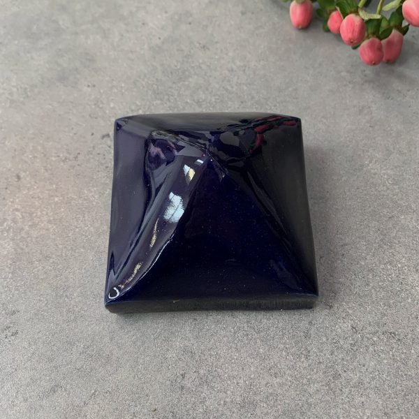 Reliquary in the shape of a royal blue pyramid