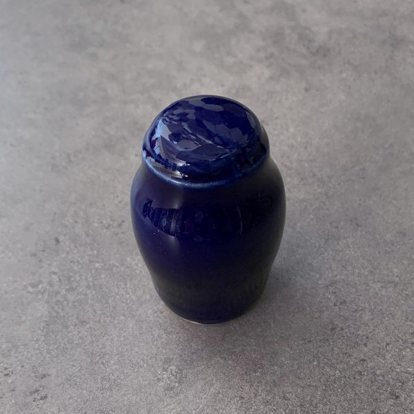 Reliquary in the shape of a small royal blue rounded urn