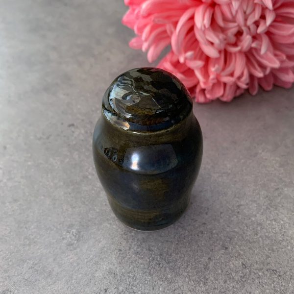 Reliquary in the shape of a small mirror rounded urn