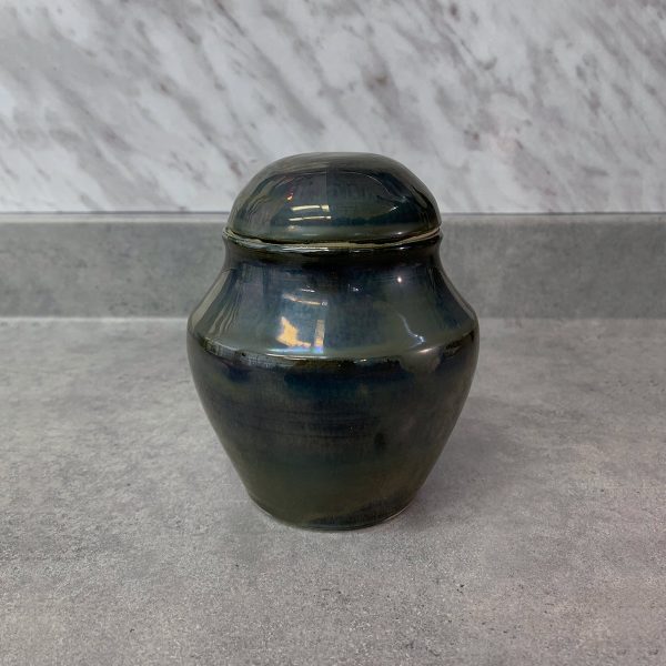 Reliquary in the shape of a small mirror urn