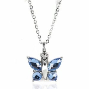 Reliquaire Pendentif - Papillon avec ailes serties de pierres bleues - Crématorium Montréal