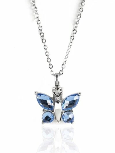 Reliquaire Pendentif - Papillon avec ailes serties de pierres bleues - Crématorium Montréal