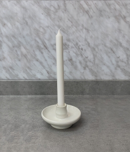 Reliquary in the shape of a white candlestick
