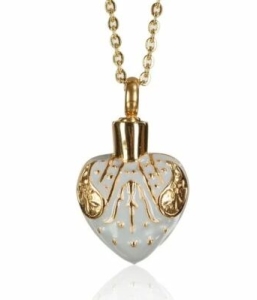 Reliquaire Pendentif – Coeur et symboles dorés